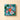Vintage Dream gift box featuring assorted Cremini, square-shaped with festive ornaments, pine needles, and a green ribbon. - AI generated text