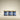 Three jars from the NO Added Sugars Spreads Bundle of 3, with blue labels and gold lids, are arranged side by side on a beige surface and background, featuring naturally delicious recipes with no added sugars.